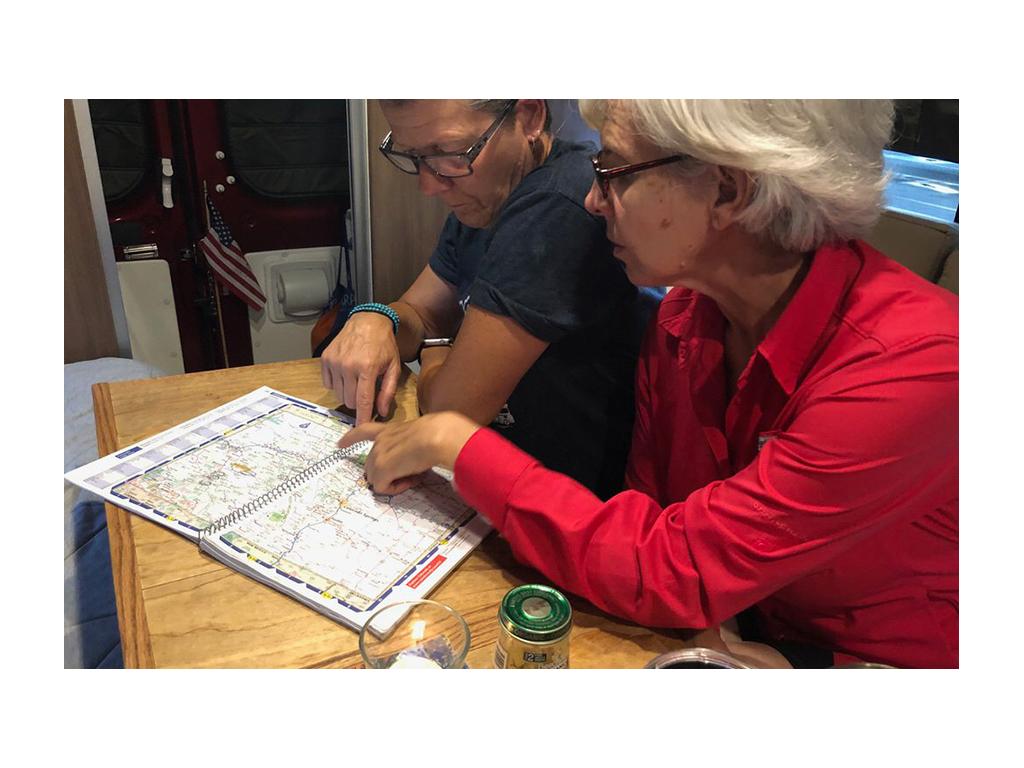 Chris and Noel looking at a map