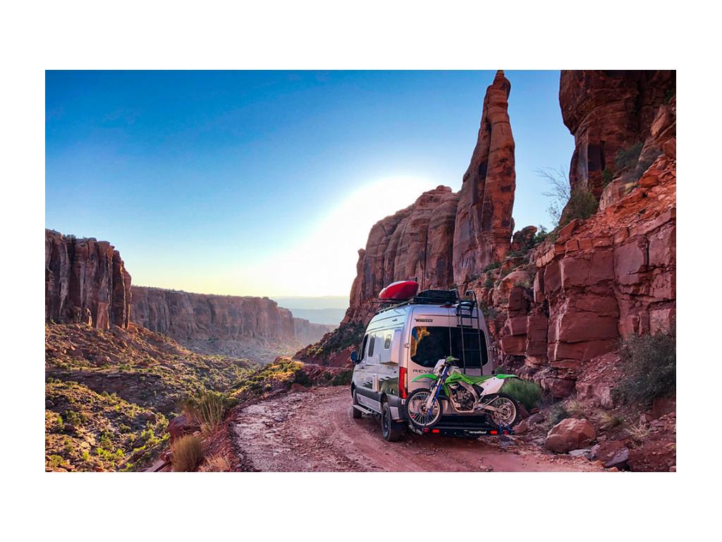 Revel driving off-road in mountains