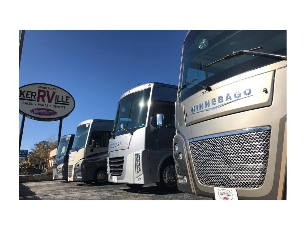 Winnebago Class A motorhomes lines up at dealership