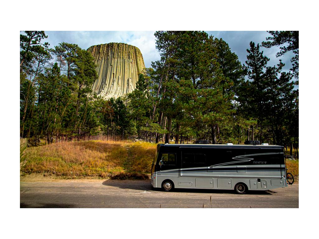 Adventurer next to Devils Tower National Monument