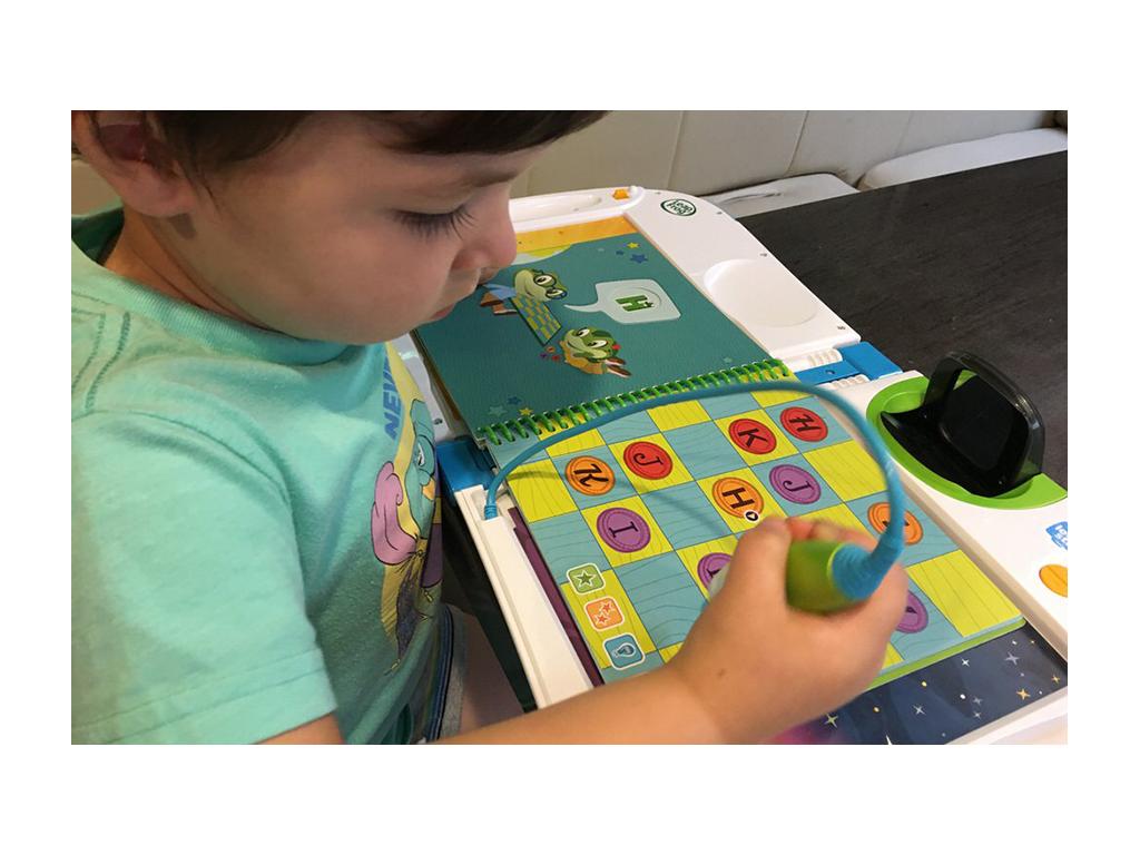 Caspian doing a LeapStart activity