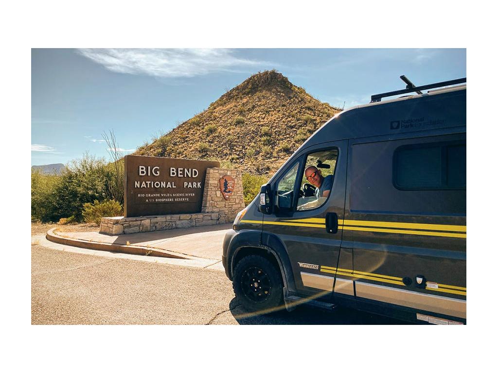 Limited Edition National Park Foundation Travato at entrance of Big Bend National Park