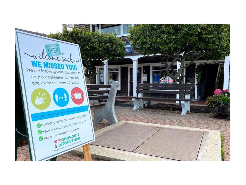 COVID-19 sign outside of shops in Maine