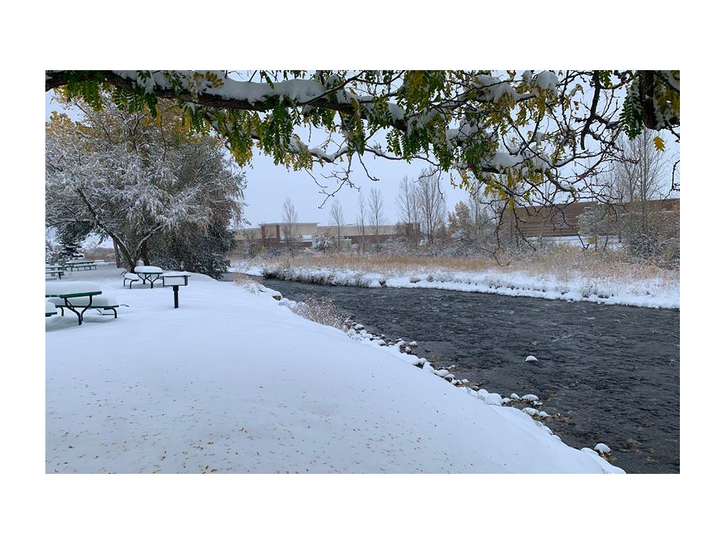 Snowy campground property near river