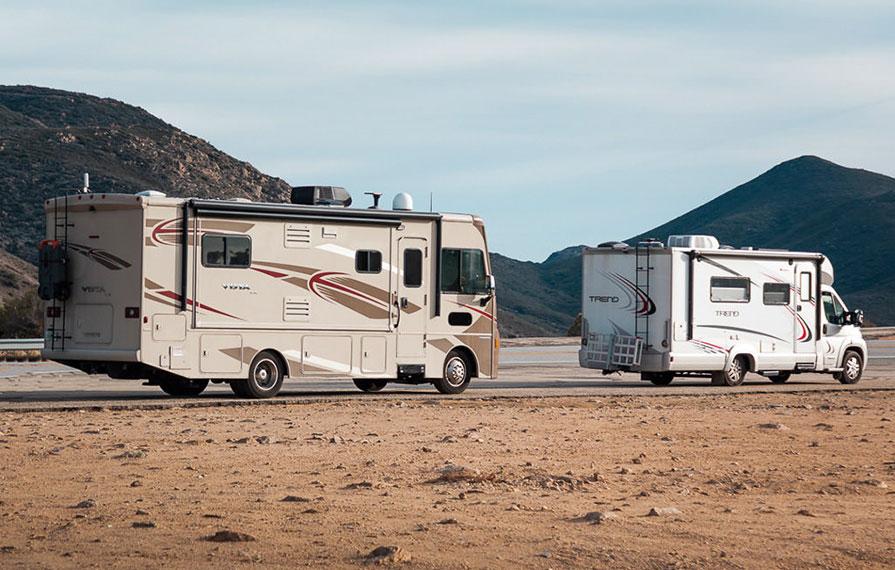 Vista parked behind Trend on road