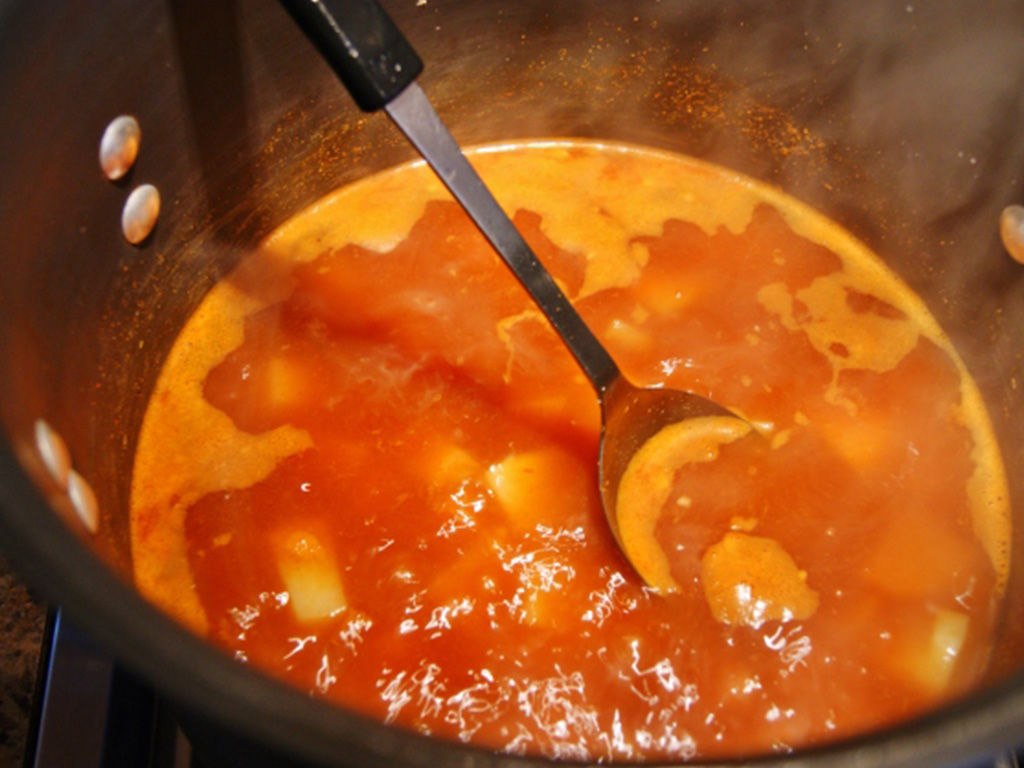 Adinaro Curried Cauliflower Bisque in pot cooking.