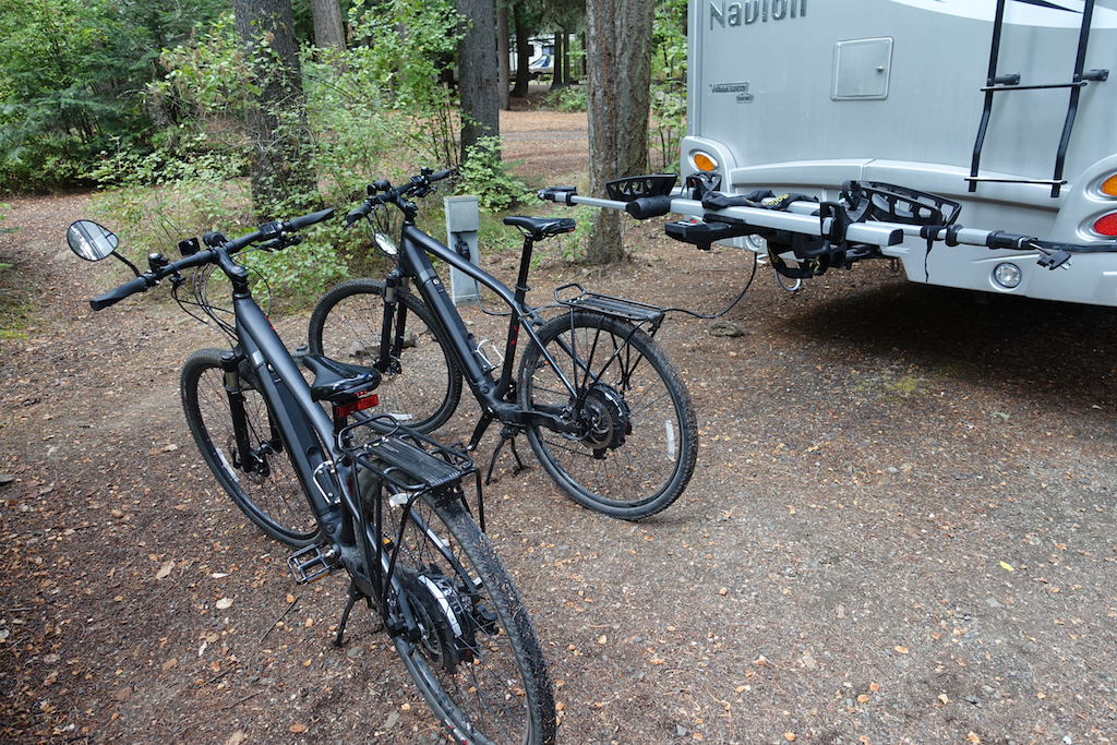Bikes parked beside an Itasca Navion.