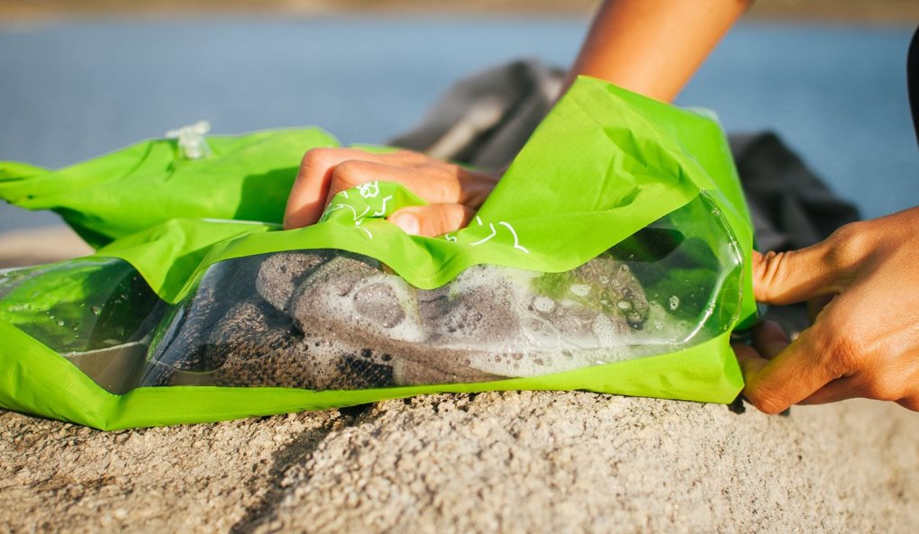 Scrubba bag in use, this bag serves as a substitute to a washing machine