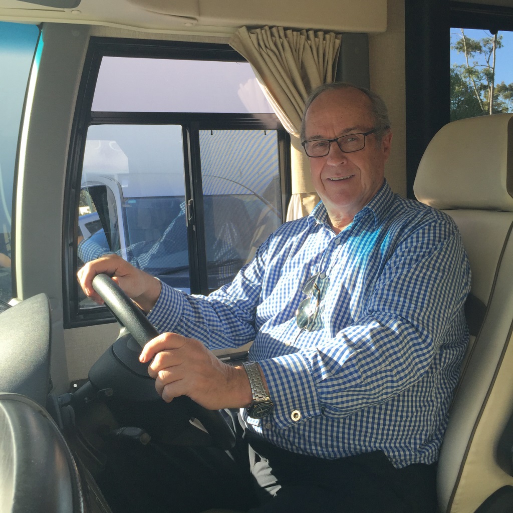 Craig in driver seat, on opposite side, of his Winnebago Via.