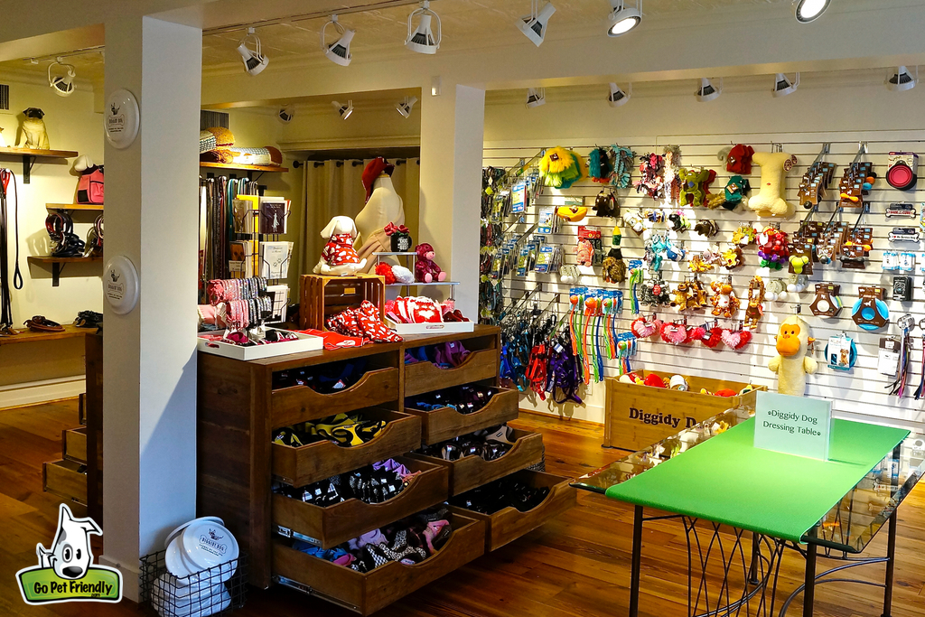 Dog and cat boutique with outfits, gear, and toys.