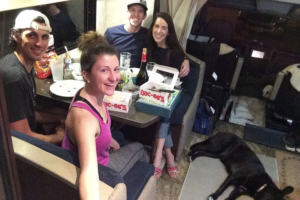 Two couples eating at Winnebago View dinette.