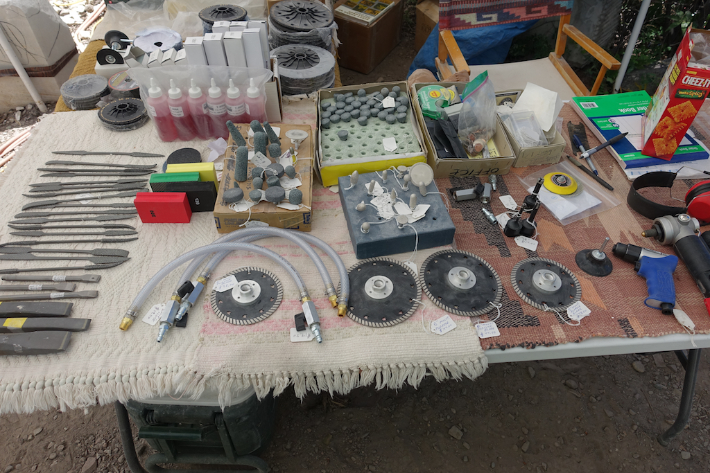 Table full of various sculpting tools.