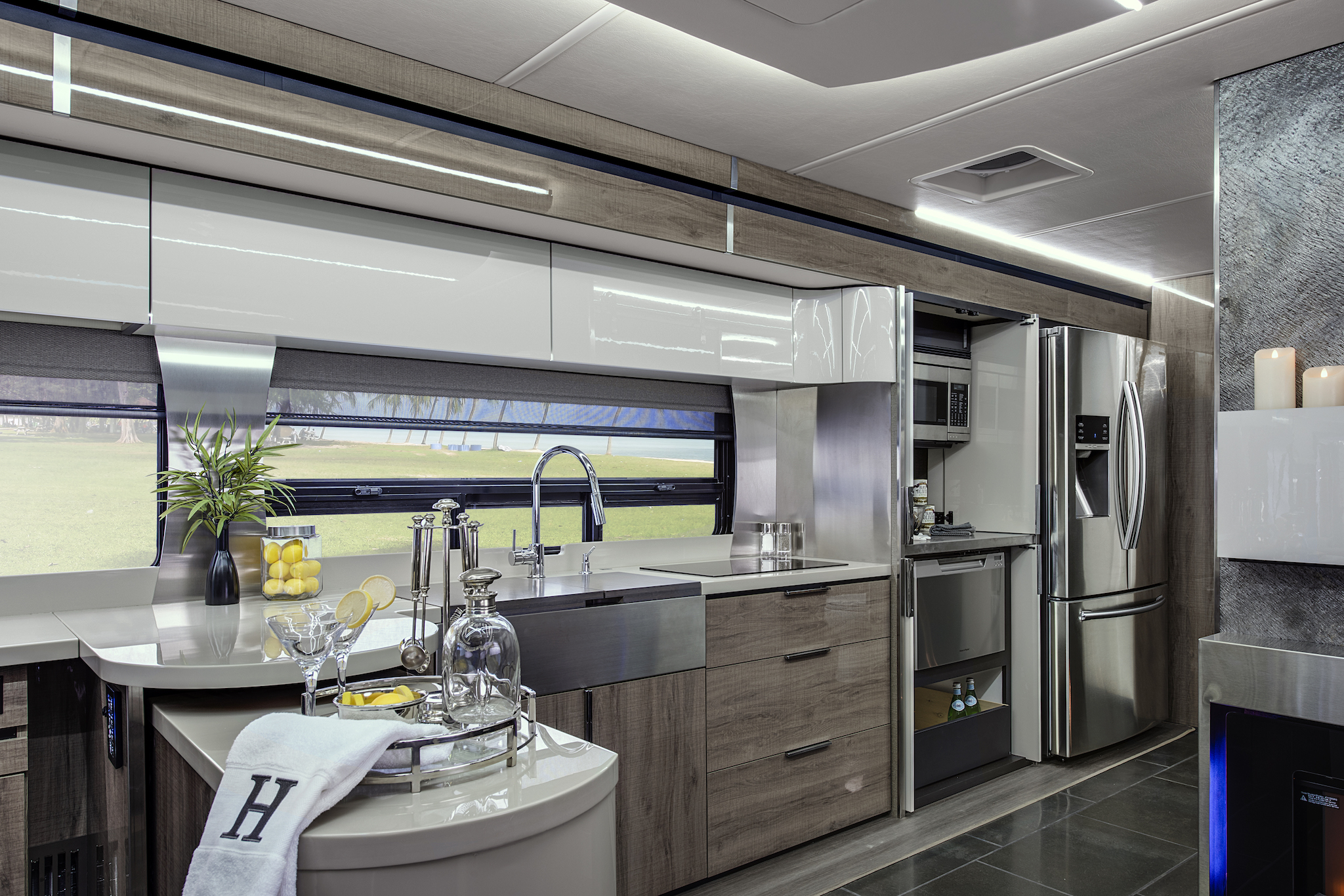 Bright and modern kitchen area of the Winnebago Horizon.