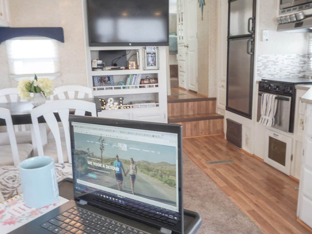 Laptop on counter of renovated RV.