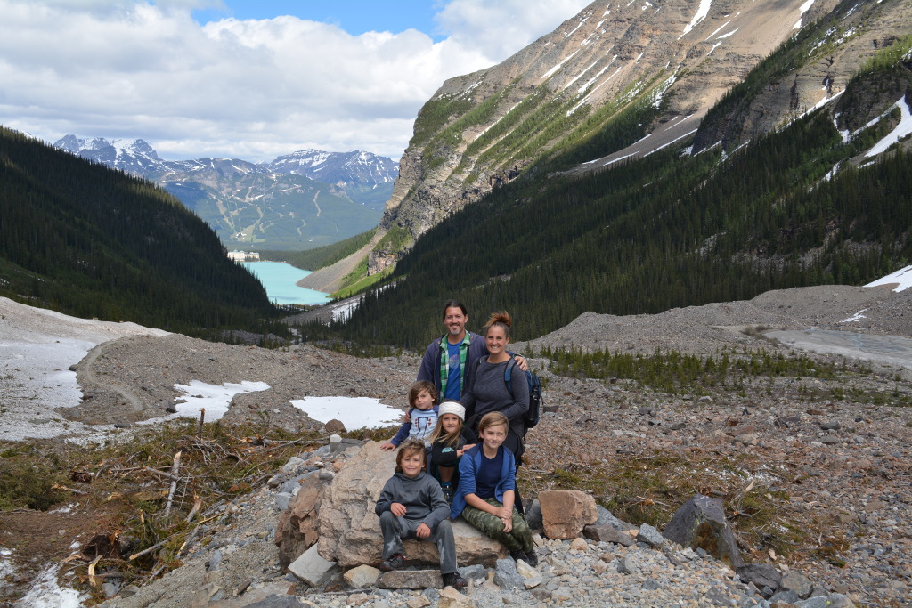 Royal family with lake and mountains in background