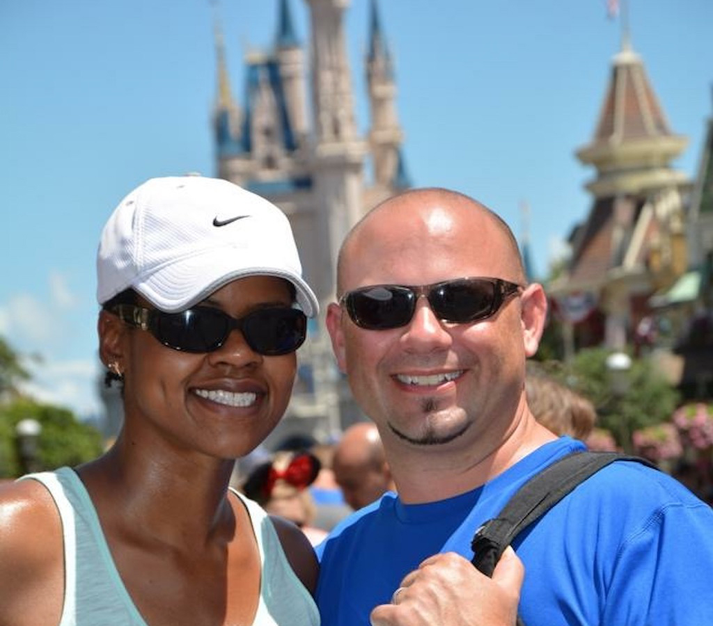 Sabrina and Kenny smiling for photo at Disney World