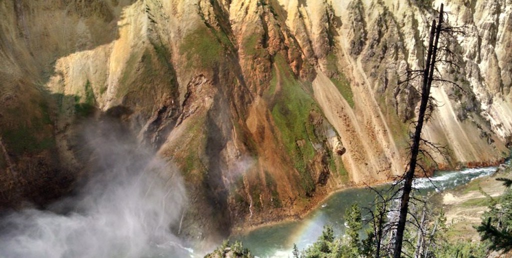 Looking down into a valley with a river running through.