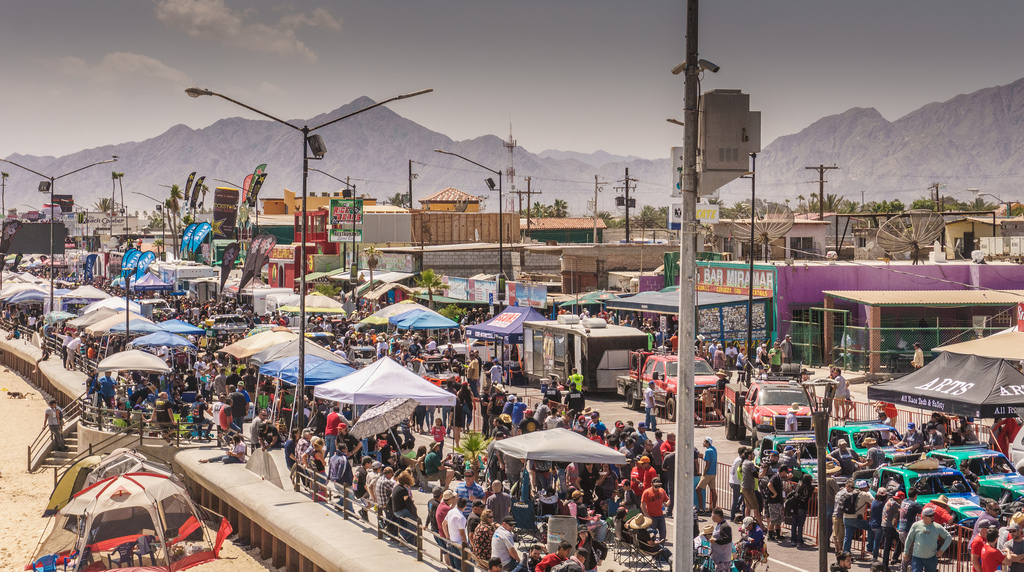 Crowds of people lined along the streets
