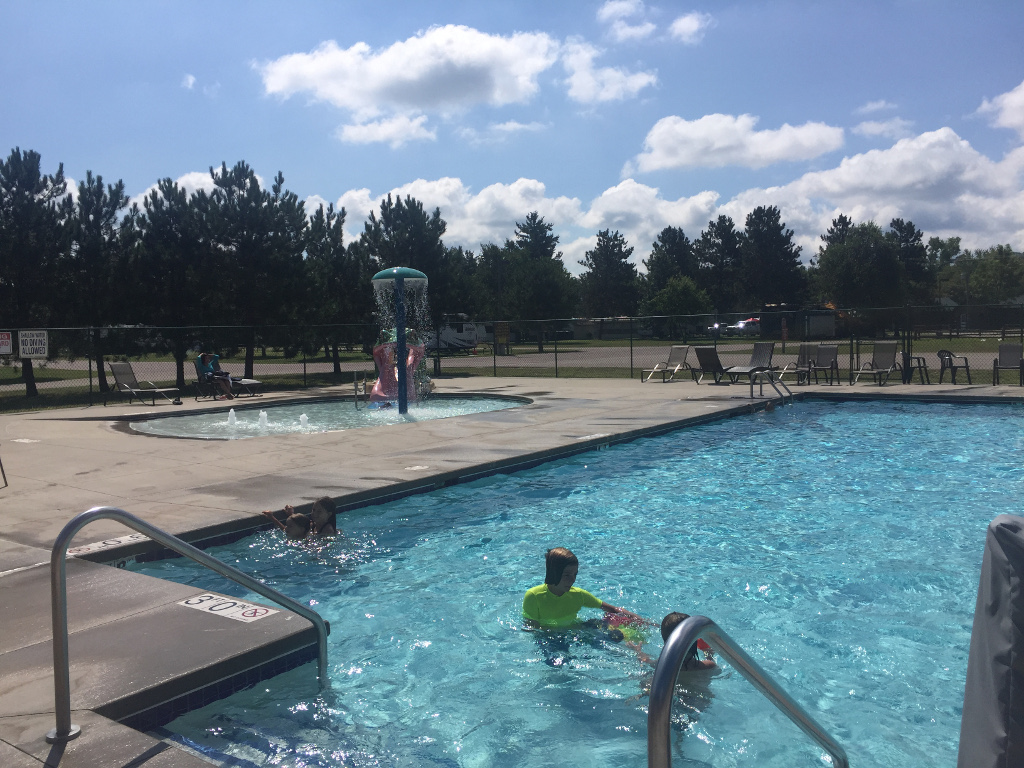 Kids playing in a pool at campground