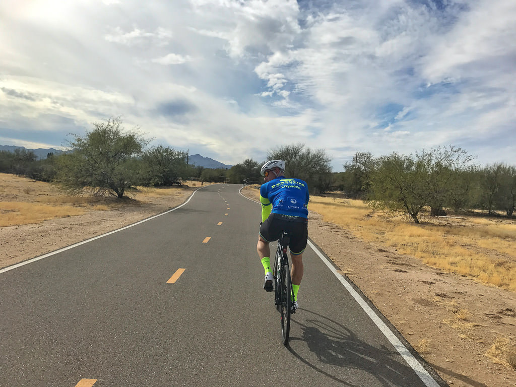James biking down bike path