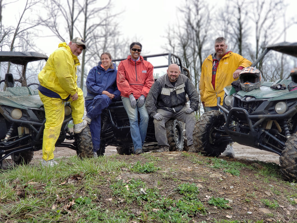 Kenny and Sabrina with three friends by ATVs