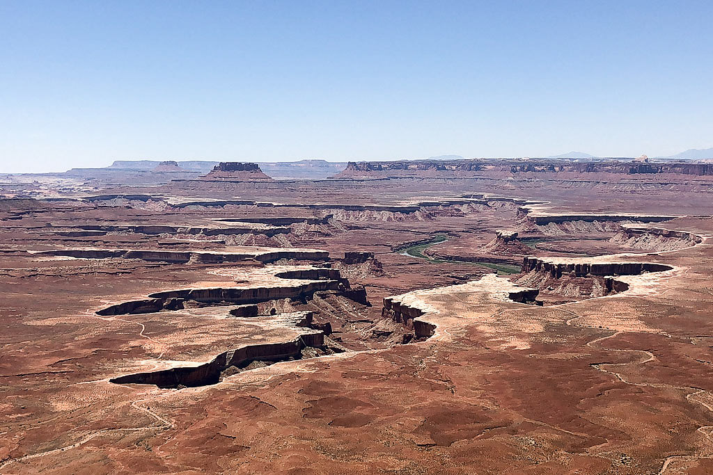 View of the Green River weaving through canyons from an overlook
