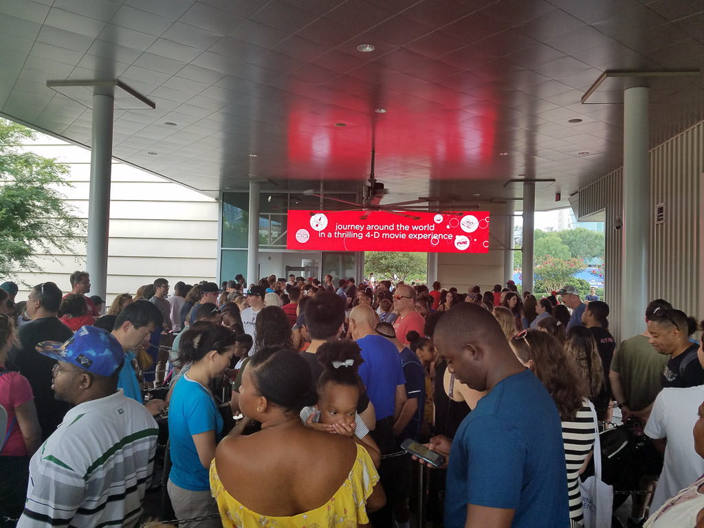 Many people gathered waiting to watch Coca-Cola movie