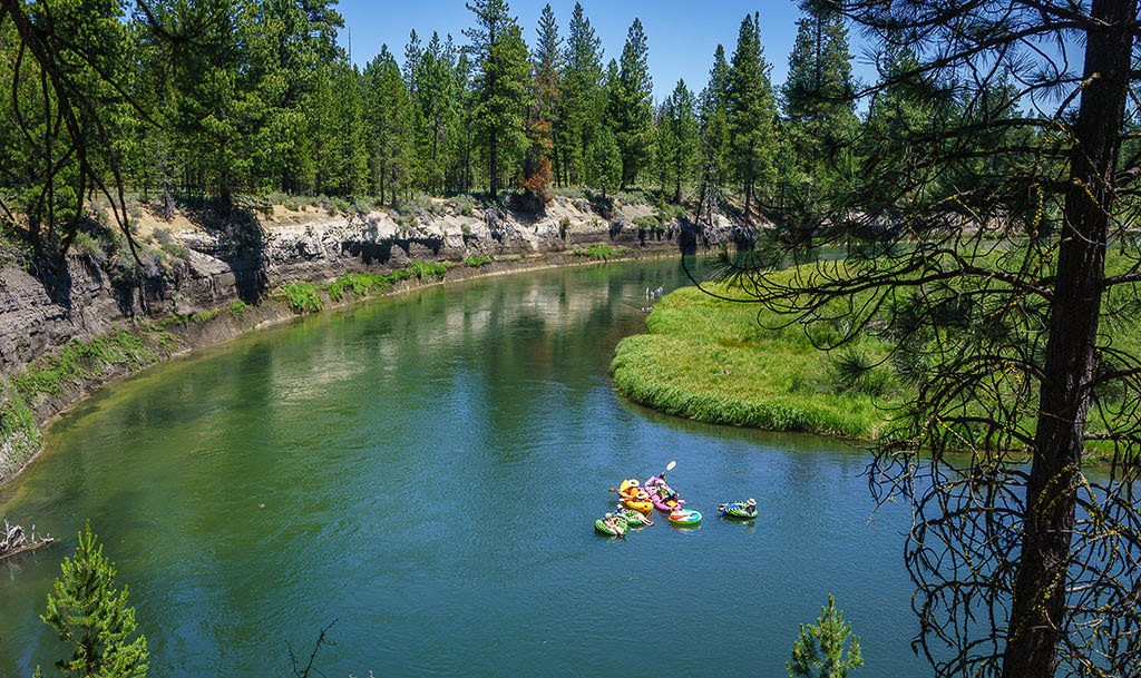 Tubers floating along Cascade Lakes.