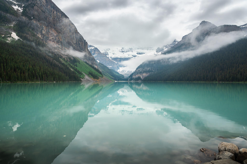 Blue water and mountains at Banff National Park.
