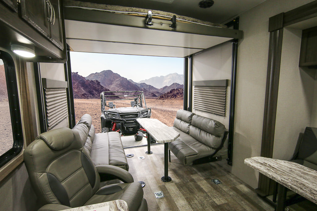 Gator at the back garage area of the Winnebago Spyder.