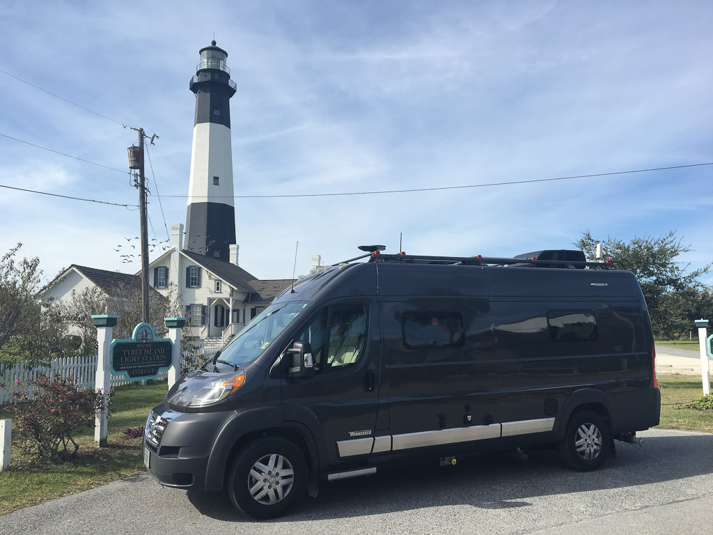 Travato in front of lighthouse 