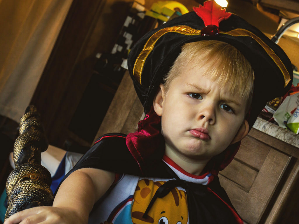 One of the boys with a costume on