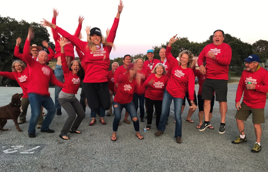 Winnebago group jumping in air for group picture