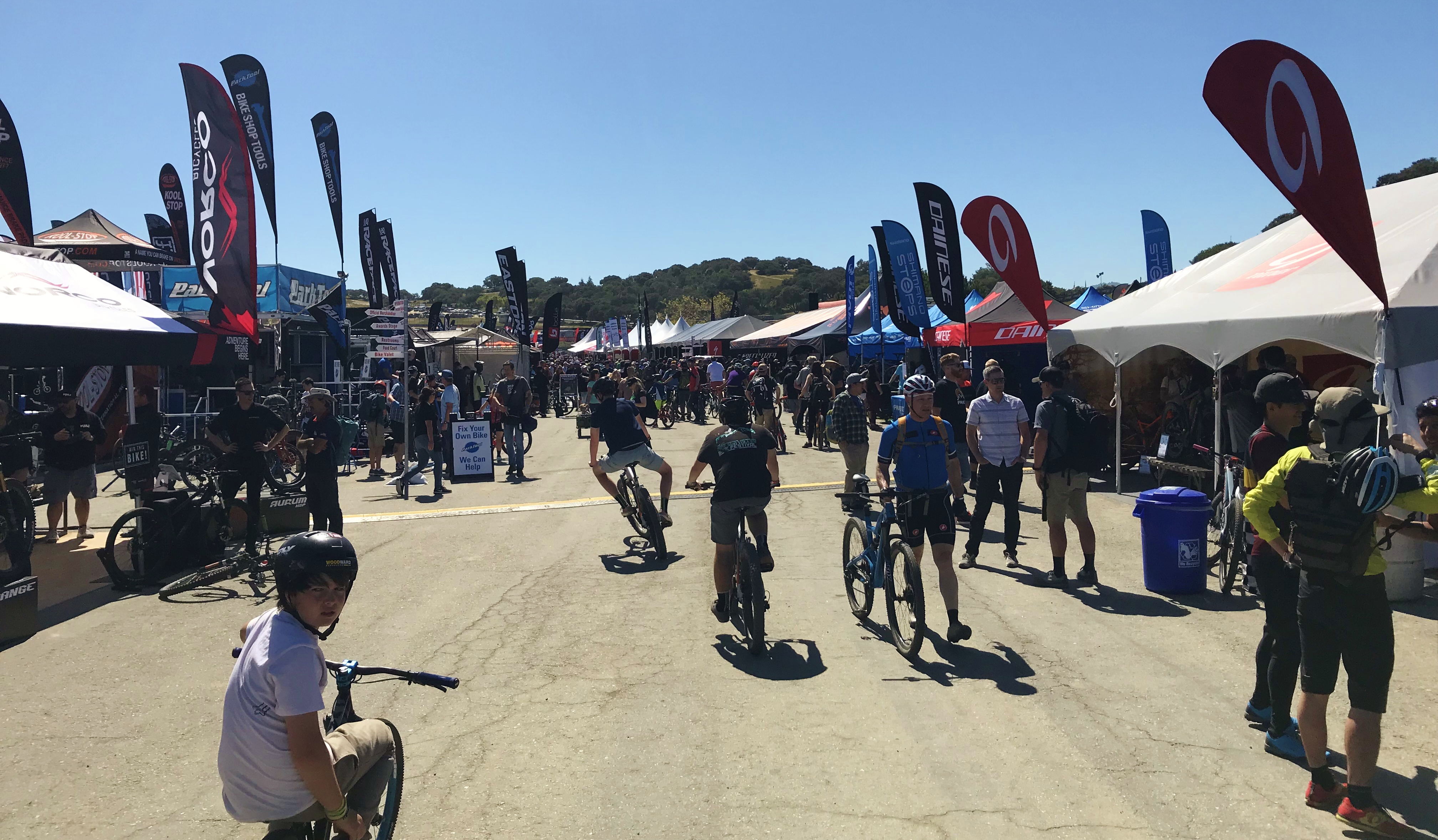 Row of vendor tents at Sea Otter Classic