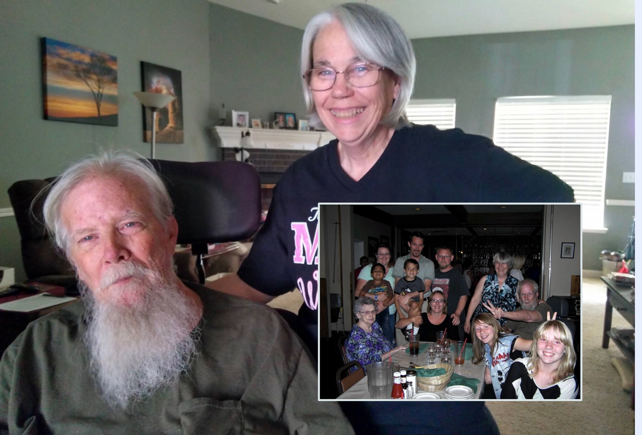 Jan and Karen in their family room with a photo of their family.