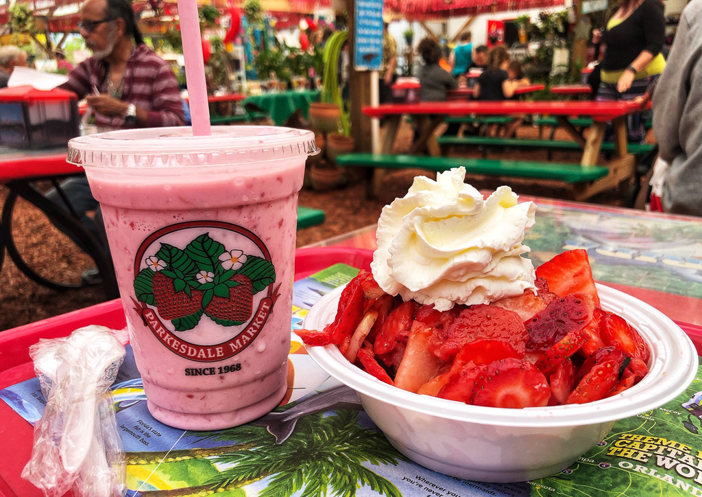 Strawberry shake and a bowl of fresh strawberries from Parkesdale Market.