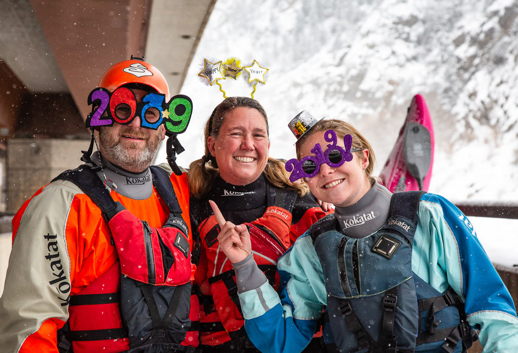 Holcombe family posing with 2019 glasses and wintry scene in the background