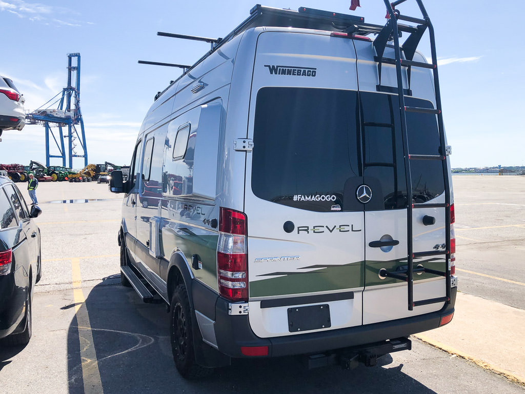 Winnebago Revel parked in parking lot.