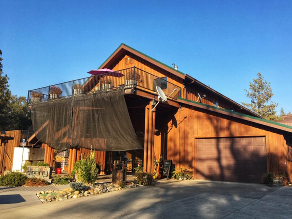 Exterior of a log cabin style home.